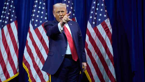 President Donald Trump points to the crowd as he walks off stage after speaking to House Republican lawmakers during their annual policy retreat, Tuesday, Jan. 6, 2026, in Washington. (AP Photo/Evan Vucci)