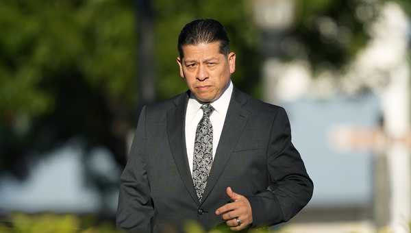 Former Uvalde Consolidated Independent School District police officer Adrian Gonzalez arrives at the Uvalde County Courthouse, Thursday, July 25, 2024, in Uvalde, Texas. Gonzales made his first court appearance on charges of abandoning and failing to protect children. (AP Photo/Eric Gay)