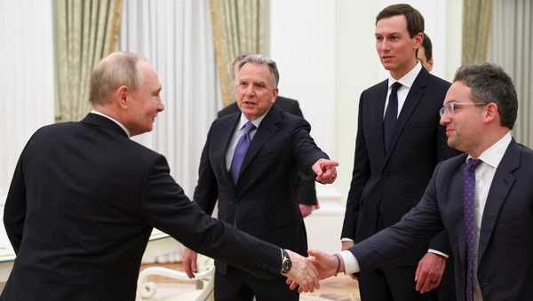 Russian President Vladimir Putin, left, greet U.S. President Donald Trump's envoys Steve Witkoff, centre left, Jared Kushner, second right, and Josh Gruenbaum, the head of the Federal Acquisition Service at the General Services Administration, at the Senate Palace of the Kremlin, in Moscow, Thursday, Jan. 22, 2026. (Alexander Kazakov/Sputnik, Kremlin Pool Photo via AP)