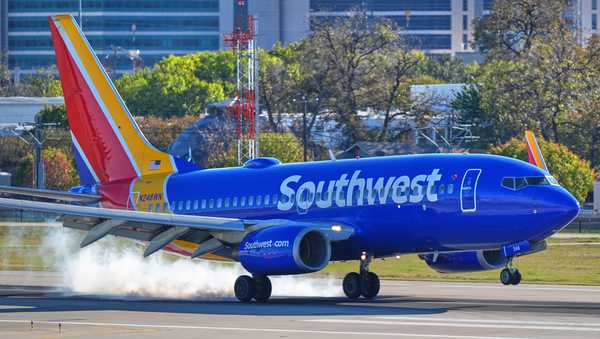 FILE - A Southwest Airlines plane lands at Love Field Airport, Nov. 26, 2025, in Dallas. (AP Photo/LM Otero, File)