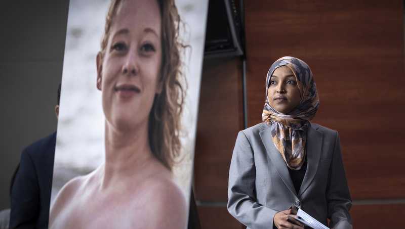Man tackled to ground after spraying unknown substance on Rep. Ilhan Omar at Minneapolis town hall