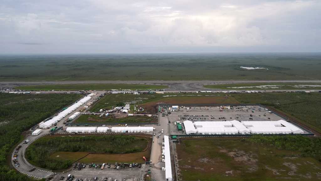 Migrants languish in US detention centers, including in Florida, amid dire conditions, long waits