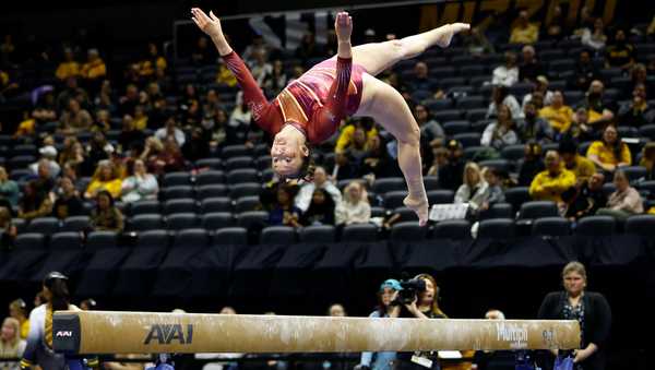 Iowa State's Frederique Sgarbossa competes on the balance beam during an NCAA college gymnastics meet against Missouri on Sunday, Jan. 4, 2026, in Columbia, Mo. (AP Photo/Colin E. Braley)