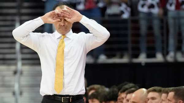 Iowa head coach Ben McCollum reacts to a foul call during the first half of an NCAA college basketball game against Wisconsin Sunday, Feb. 22, 2026, in Madison, Wis. (AP Photo/Kayla Wolf)