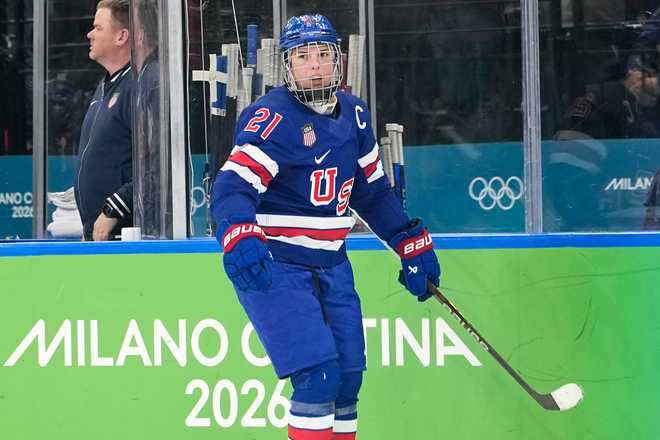 United States&amp;apos; Hilary Knight (21) celebrates after scoring her side&amp;apos;s opening goal during a women&amp;apos;s ice hockey gold medal game between the United States and Canada at the 2026 Winter Olympics, in Milan, Italy, Thursday, Feb. 19, 2026. (AP Photo/Hassan Ammar)