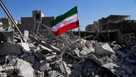 An Iranian flag is placed among the ruins of a police station struck Monday during the U.S.–Israeli military campaign in Tehran, Iran, Tuesday, March 3, 2026. 