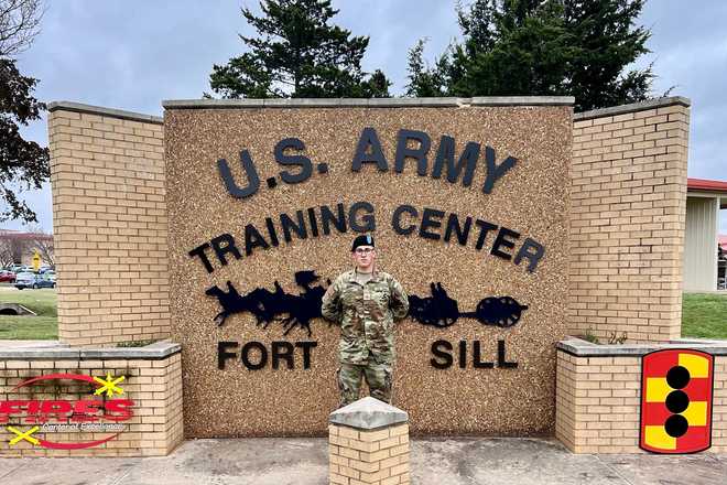 This photo provided by Andrew Coady shows his son, Declan Coady, posing for a photo on the day of his graduation at U.S. Army Training Center at Fort Sill, Okla., March 15, 2024. (Andrew Coady via AP)