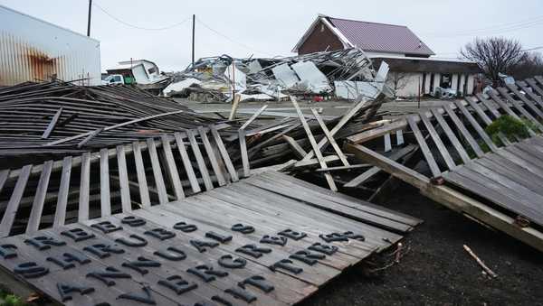 A storm-damaged Tholens' Landscape & Garden center is in ruins in the aftermath of a powerful storm that ripped through the area a day earlier in Kankakee, Ill., Wednesday, March 11, 2026.
