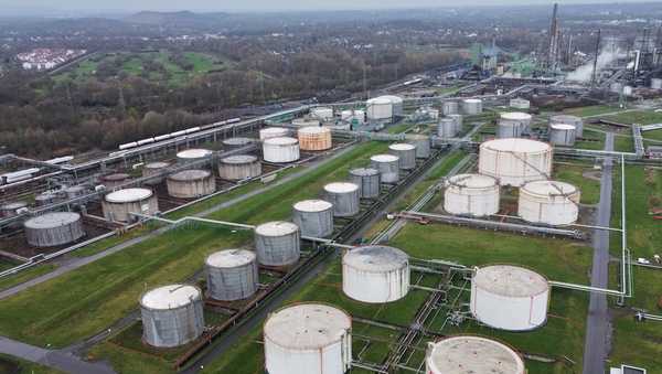 Big oil tanks are pictured in front of the BP refinery in Gelsenkirchen, one of the biggest fuel producers in Germany, Wednesday, March 11, 2026. (AP Photo/Martin Meissner)