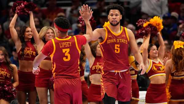 Iowa State's Joshua Jefferson (5) and Tamin Lipsey (3) celebrate during the second half of an NCAA college basketball game against Texas Tech in the quarterfinal round of the Big 12 Conference tournament Thursday, March 12, 2026, in Kansas City, Mo. (AP Photo/Charlie Riedel)