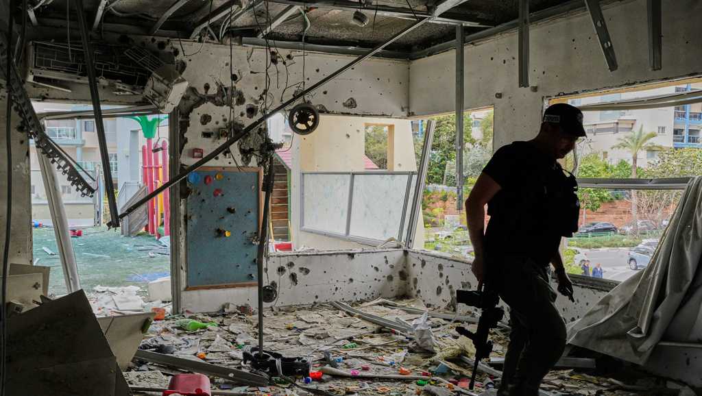 Dozens injured in Israel after Iranian missile strikes target areas near nuclear research center