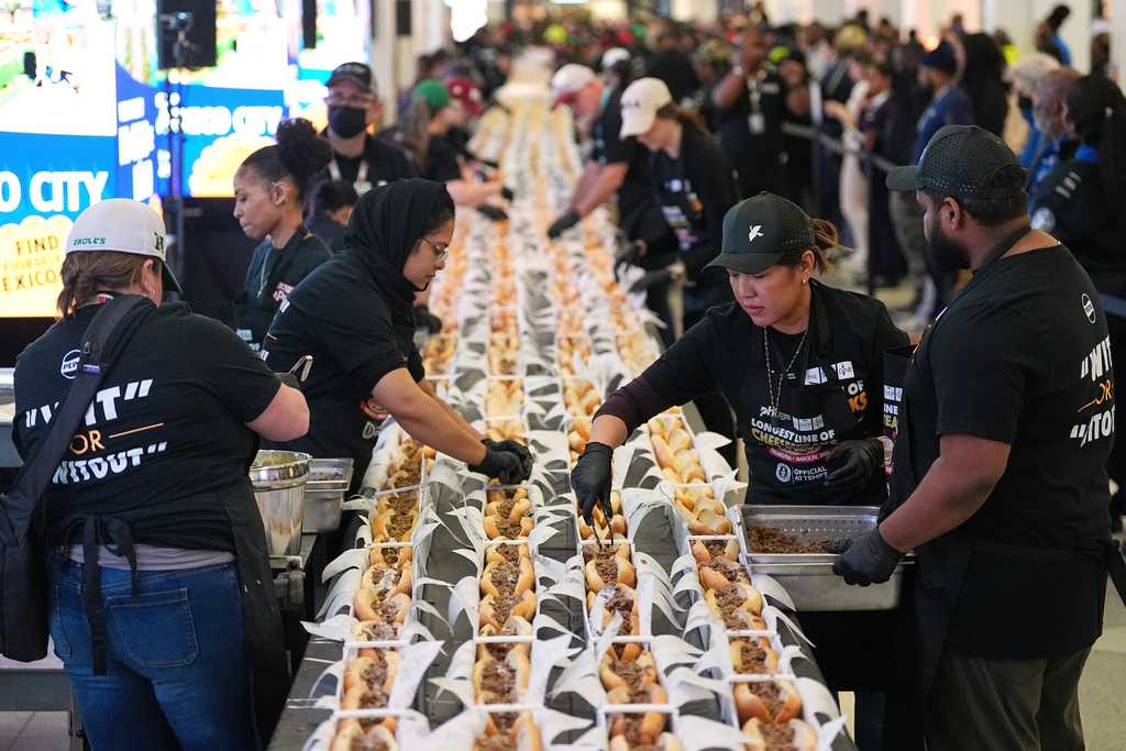 Philly celebrates its signature food as its airport sets a record for longest cheesesteak line