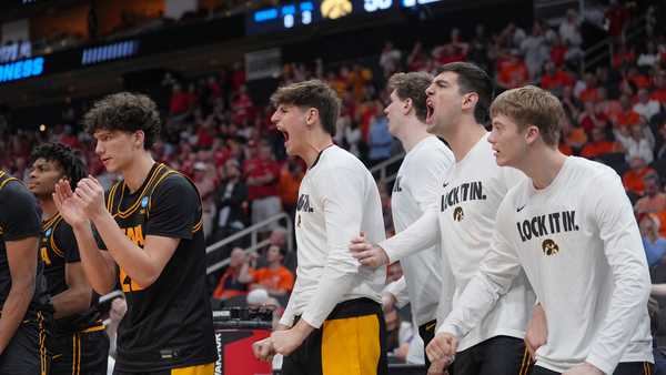 The Iowa bench celebrates during the second half against Nebraska in the Sweet 16 of the NCAA college basketball tournament Thursday, March 26, 2026, in Houston. (AP Photo/Eric Gay)