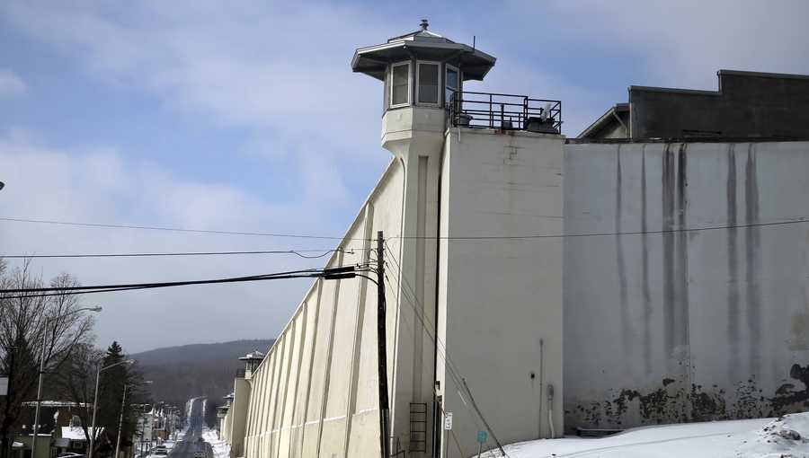 A guard tower at the Clinton Correctional Facility is seen along Cook Street, Sunday, Jan. 15, 2017, in Dannemora, N.Y. The facility is a New York State Department of Correctional Services maximum security state prison for men. (AP Photo/Mel Evans)