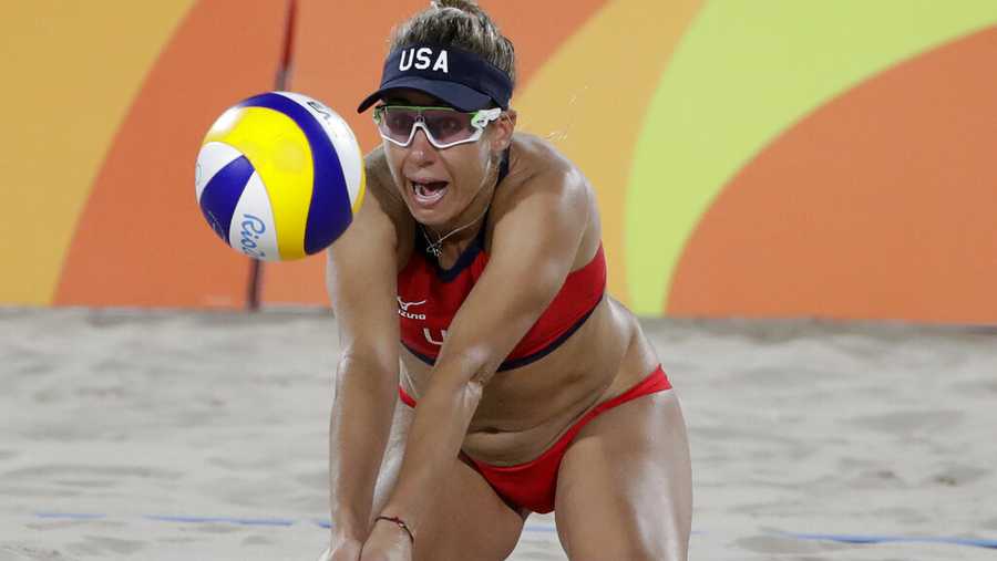FILE - In this Wednesday, Aug. 17, 2016 file photo, The United States&apos; April Ross passes a ball while playing against Brazil during the women&apos;s beach volleyball bronze medal match of the 2016 Summer Olympics in Rio de Janeiro, Brazil. Two-time Olympic beach volleyball medalist April Ross has a rare opportunity to relax with 100 days to go before the Tokyo Games. That doesn’t mean that she will. Ross and partner Alix Klineman are the No. 1 team in the Olympic qualification rankings and the only Americans who have already clinched one of four likely spots for U.S. beach teams in the pandemic-delayed 2020 Games. (AP Photo/Marcio Jose Sanchez, File)