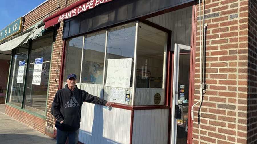 Aram Pastaljian, owner of Aram's Café in Belmont, Massachusetts, stands outside his restaurant.