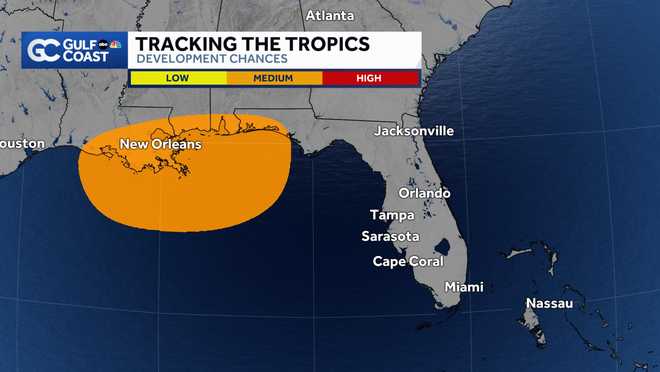 Tropical low spreading heavy rain and flooding along northern Gulf Coast