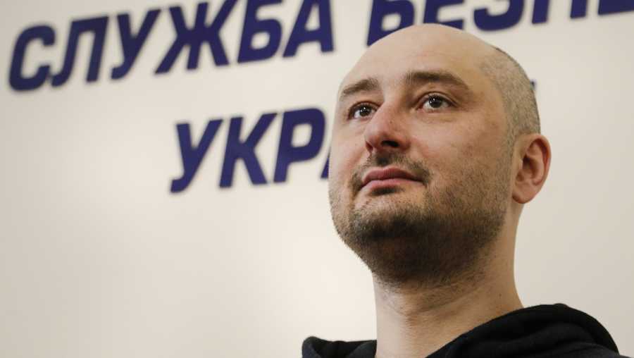 Russian journalist Arkady Babchenko, listens for a question during a news conference with Vasily Gritsak, head of the Ukrainian Security Service and Ukrainian Prosecutor General Yuriy Lutsenko at the Ukrainian Security Service on Wednesday, May 30, 2018. 