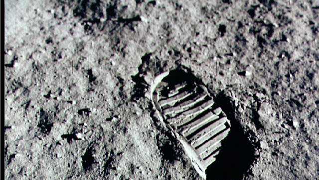 omega first step on the moon