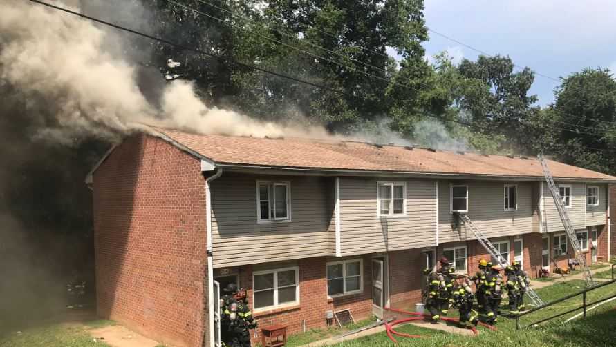 Firefighter injured in Asheville apartment fire, blaze under