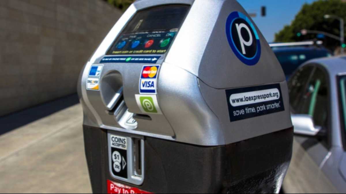 Asheville warns visitors of suspicious QR code sticker on parking meters