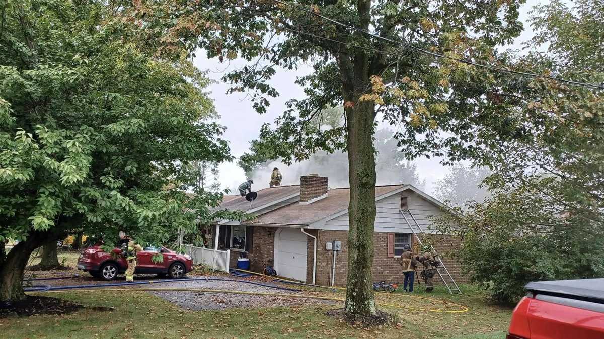 PHOTOS: Fire crews tear open ceiling to battle attic fire in Franklin ...