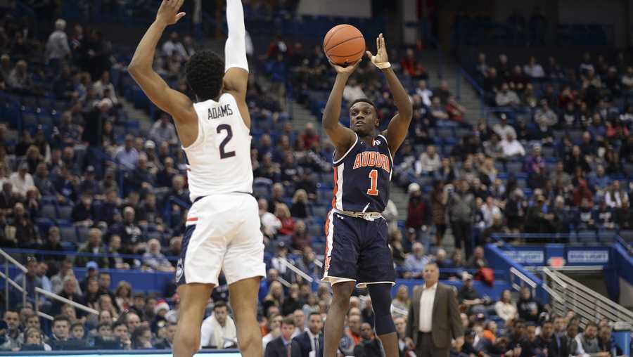 Auburn beats UConn 7067 in overtime for 10th win