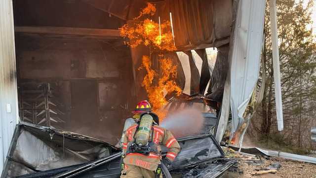 Officials: Car engulfed in flames after crashing into building in Aurora - Vimarsana News