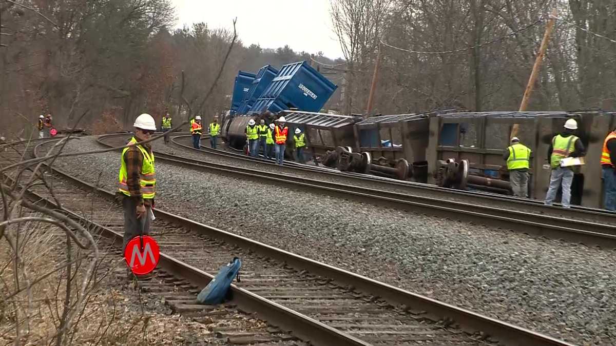 Cleanup continues after train derails in Ayer