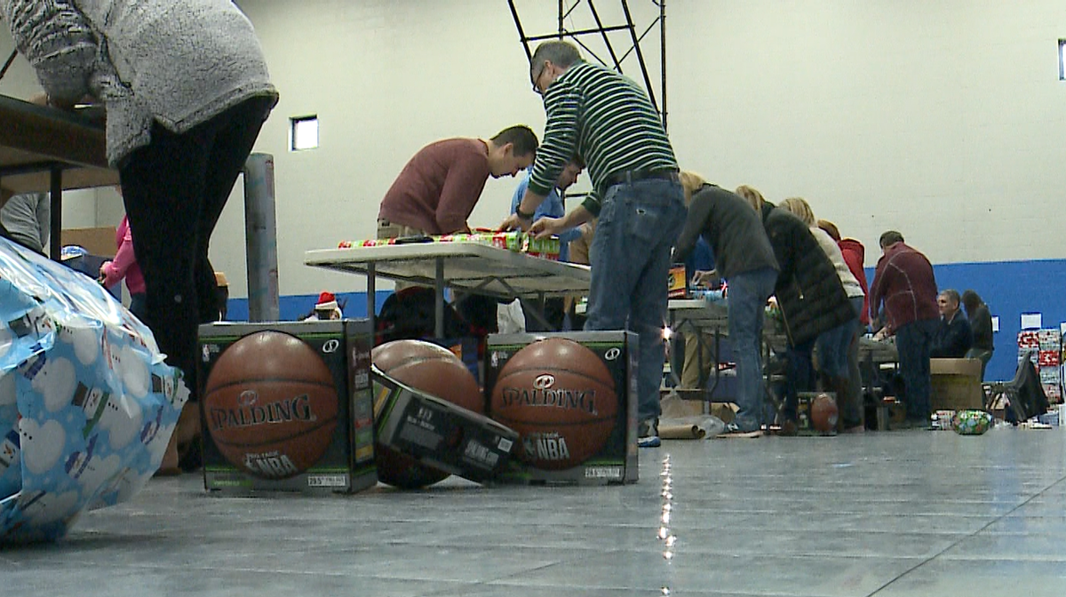 Volunteers wrap thousands of gifts for kids in Boys and Girls Club of
