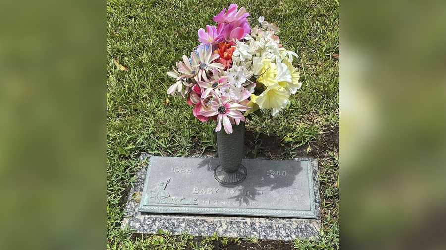 This photo provided by the Jackson County Sheriff’s Department shows the grave marker of Baby Jane II at Jackson County Memorial Park in Pascagoula, Mississippi.