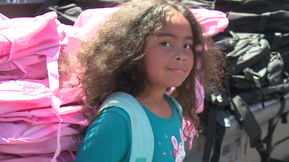 Backpack giveaway gives schools' start a boost