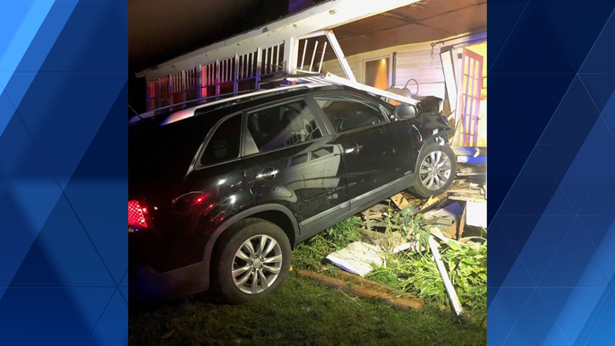 Car crashes into Detroit home, driver charged with OUI