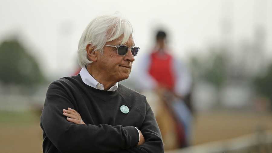 FILE = trainer Bob Baffert watches his Kentucky Derby entrant Game Winner during a workout at Churchill Downs in Louisville, Ky. Baffert’s lawyer said Wednesday, June 2, 2021, that a split-sample test of Kentucky Derby winner Medina Spirit came back positive for the presence of the steroid betamethasone, which could lead to the horse’s disqualification and discipline for the Hall of Fame trainer.  (AP Photo/Charlie Riedel, File)