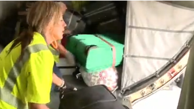 watch-charlotte-airport-baggage-handler-found-inside-plane-cargo-hold