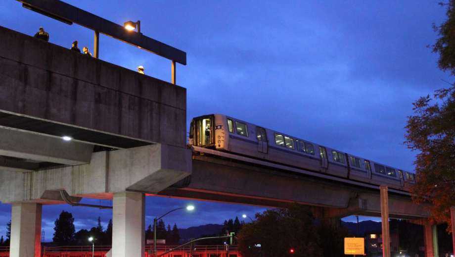 Hundreds evacuate rail line after smoke, fire reported at overhead