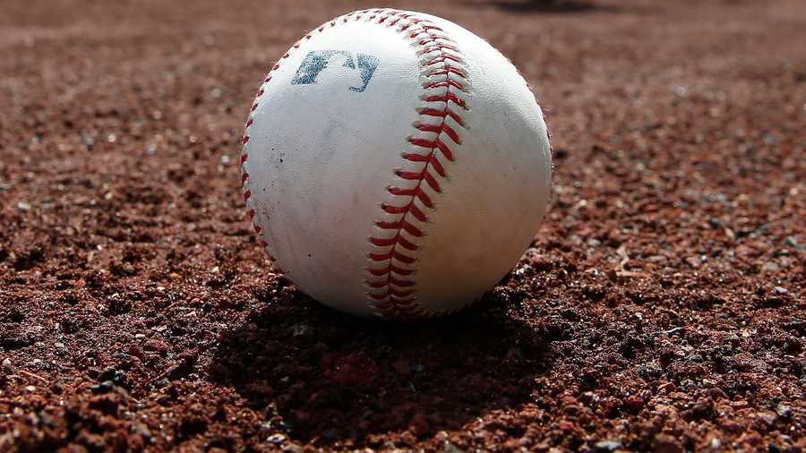 A ball sits on the field before an opening day baseball game between the Boston Red Sox and the Baltimore Orioles, Friday, April 2, 2021, in Boston. (AP Photo)