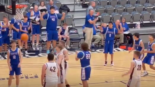 watch-oklahoma-high-school-basketball-teams-pause-to-let-player-with