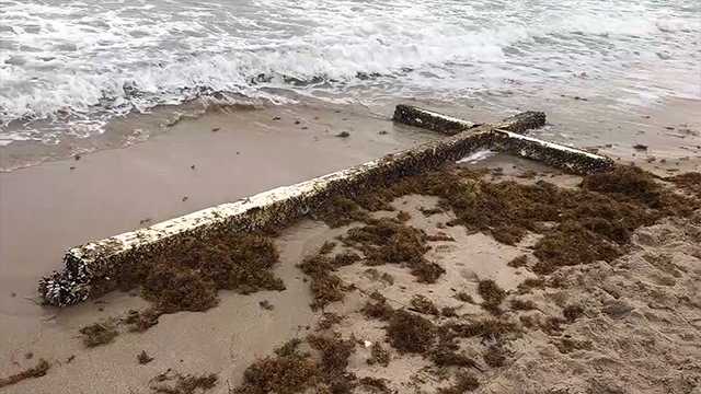Mystery of the giant beached cross may be solved - KCRA