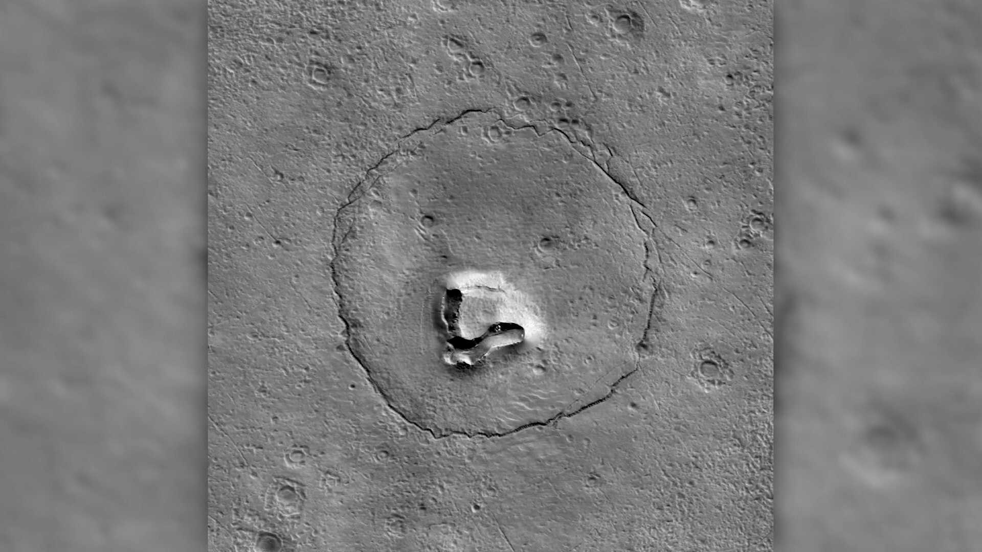 NASA orbiter captures image of a bear's face on Mars - Vimarsana News