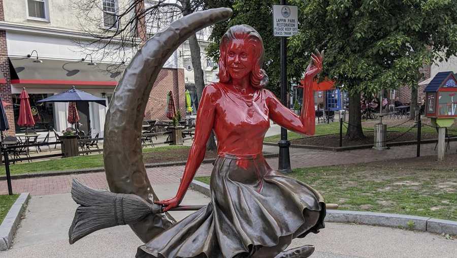 FILE - This image provided by Daniel Fury shows the "Bewitched" statue partially covered with red paint on June 6, 2022, in Salem, Mass. A man has plead guilty Tuesday, Sept. 20, 2022, to vandalizing the tourist favorite statue in Salem and will be sentenced to 18 months of probation for dousing the bronze statue with red paint earlier in the summer.