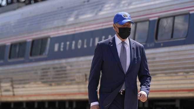 President&#x20;Joe&#x20;Biden&#x20;arrives&#x20;to&#x20;speak&#x20;at&#x20;an&#x20;event&#x20;to&#x20;mark&#x20;Amtrak&#x27;s&#x20;50th&#x20;anniversary&#x20;at&#x20;30th&#x20;Street&#x20;Station&#x20;in&#x20;Philadelphia,&#x20;Friday,&#x20;April&#x20;30,&#x20;2021.