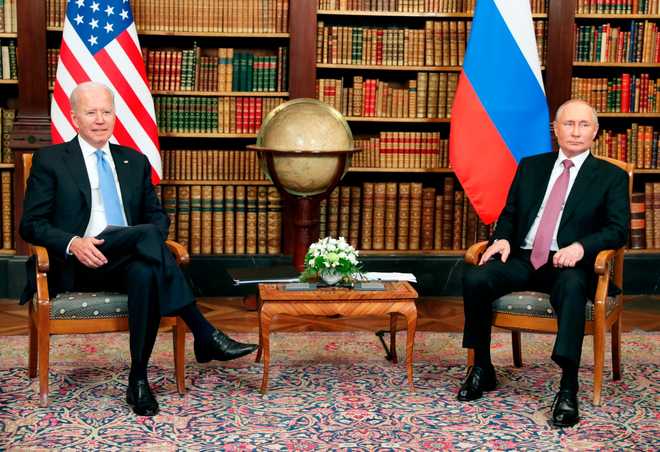 U.S President Joe Biden, left, and Russian President Vladimir Putin pose for media during their meeting at the 'Villa la Grange' in Geneva, Switzerland in Geneva, Switzerland, Wednesday, June 16, 2021.