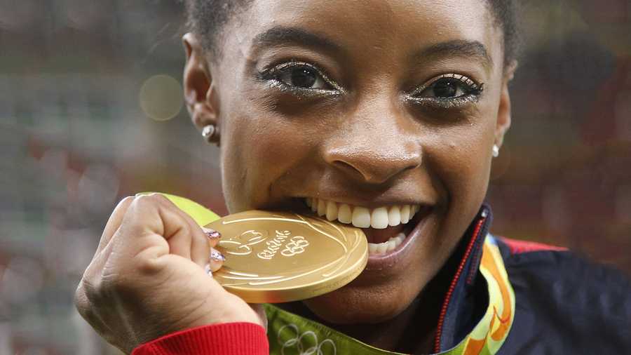 Simone Biles to carry American flag during closing ceremony