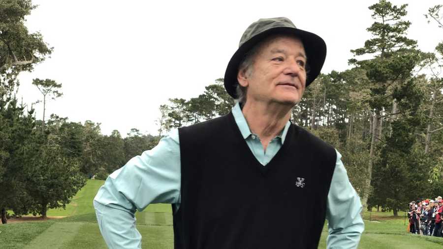 Bill Murray out for a rainy day of golf