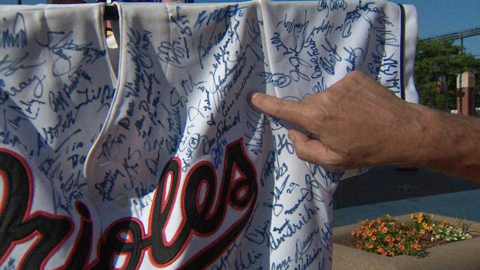 Orioles fan shows 218 autographs on jersey