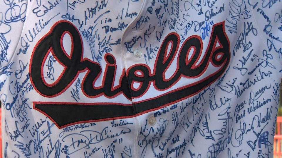 Orioles fan collects hundreds of autographs from former players