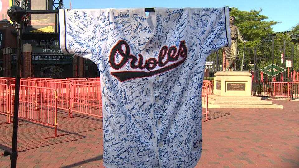 Orioles fan shows 218 autographs on jersey