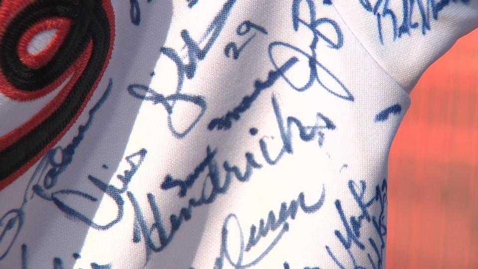 Orioles fan shows 218 autographs on jersey