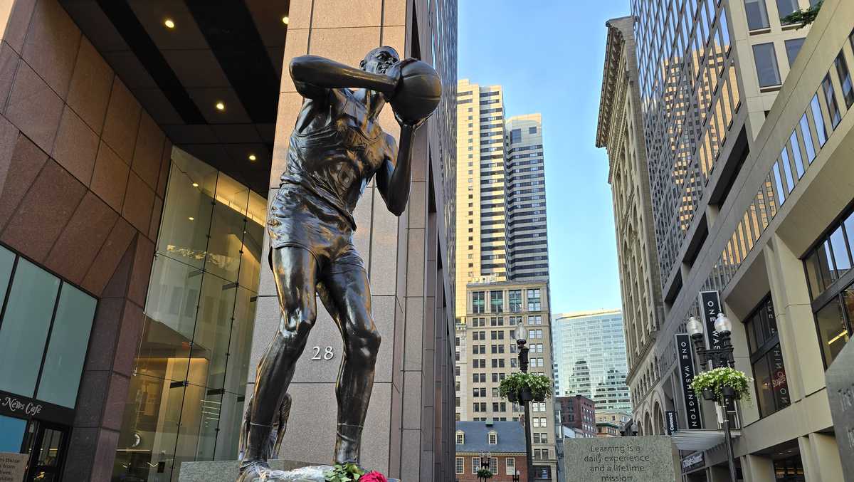 Flowers laid at base of Bill Russell statue in Boston after Celtics win